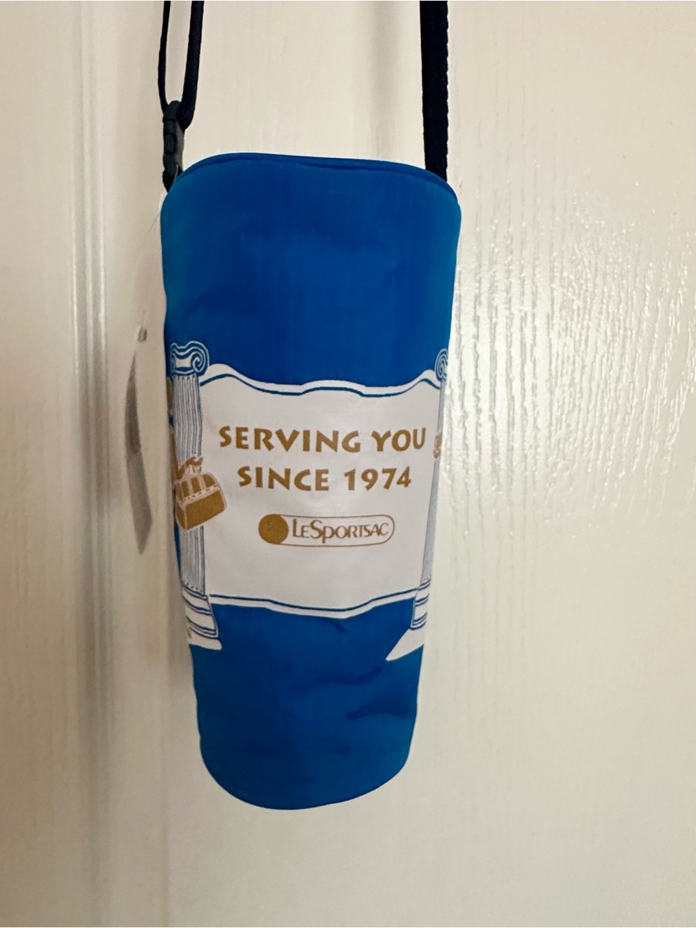 Lesportsac Blue Bottle Carrier with Gold Accent Graphic